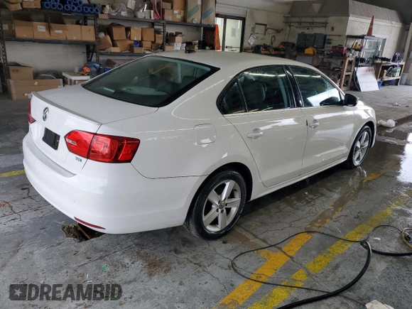 2013 Volkswagen Jetta TDI w/Premium with VIN 3VWLL7AJ0DM351270, listed as a Copart auction lot 71204324 with 91,075 mi miles and Salvage title. Bid and sale history available at DreamBid. Image 3.