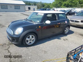 2011 MINI Hardtop z VIN WMWSU3C59BT184505, wystawiony jako Copart lot #66719785 z przebiegiem 114 686 mil mil oraz Czysty tytuł • Clean title. Historia ofert i sprzedaży dostępna na DreamBid. Obrazek 1.