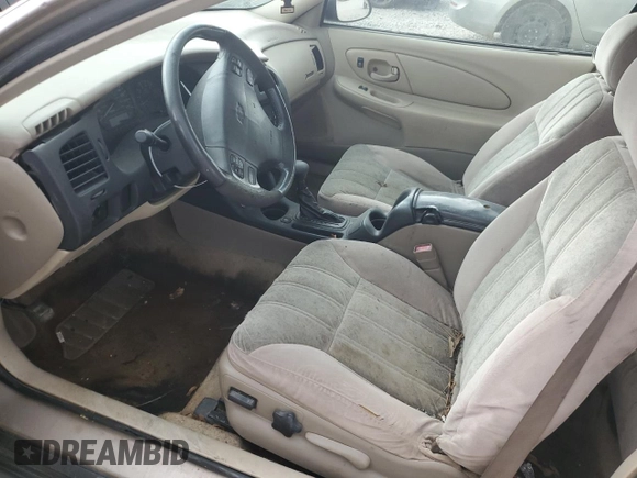 2001 Chevrolet Monte Carlo LS z VIN 2G1WW12E519209306, wystawiony jako Copart lot #74238624 z przebiegiem 208 918 mil mil oraz Szkoda całkowita • Salvage title. Historia ofert i sprzedaży dostępna na DreamBid. Obrazek 7.