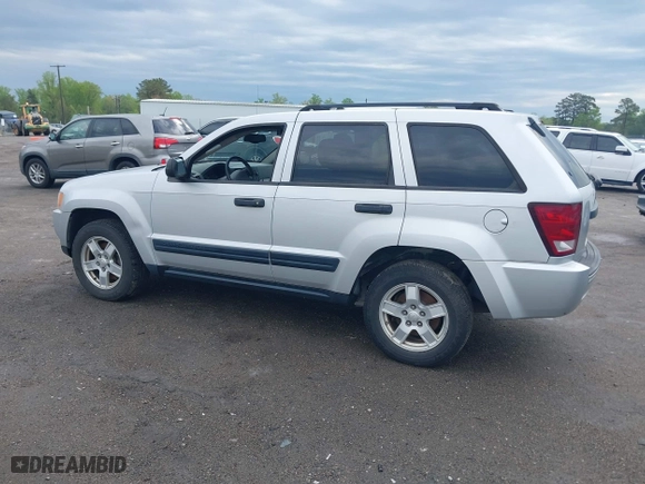 2005 Jeep Grand Cherokee Laredo with VIN 1J4GS48K75C644259, listed as a IAAI auction lot 42044878 with 250,841 mi miles. Bid and sale history available at carsss.com. Image 3.