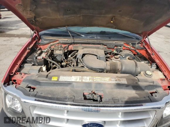 2001 Ford F-150 XLT z VIN 1FTRW07L41KF97200, wystawiony jako Copart lot #51093245 z przebiegiem 227 310 mil mil oraz Szkoda całkowita • Salvage title. Historia ofert i sprzedaży dostępna na DreamBid. Obrazek 11.