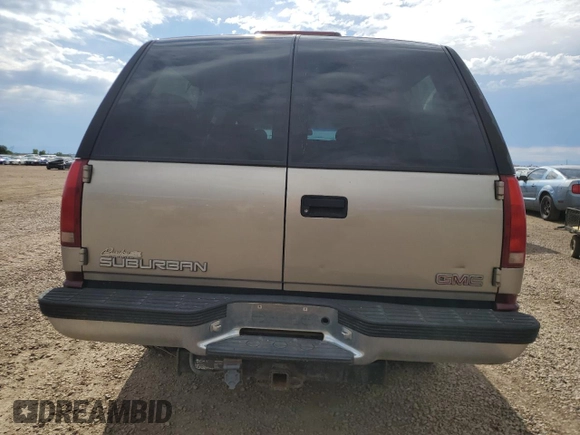 1998 GMC Suburban with VIN 1GKFK16RXWJ721305, listed as a Copart auction lot 64112165 with 197,756 mi miles and Clean title. Bid and sale history available at DreamBid. Image 6.