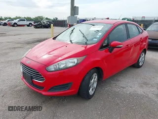 2015 Ford Fiesta SE with VIN 3FADP4BJ9FM129246, listed as a IAAI auction lot 42177812 with 87,925 mi miles. Bid and sale history available at carsss.com. Image 2.