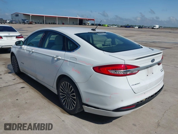 2018 Ford Fusion Titanium with VIN 3FA6P0RU3JR124007, listed as a IAAI auction lot 42207863 with 179,708 mi miles and . Bid and sale history available at DreamBid. Image 3.