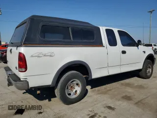 2000 Ford F-150 XL with VIN 1FTRX18W2YNC34320, listed as a Copart auction lot 77832404 with 217,448 mi miles and Clean Title. Bid and sale history available at carsss.com. Image 3.