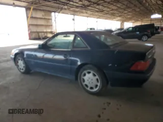 1994 Mercedes-Benz SL 5.0L with VIN WDBFA67E2RF092295, listed as a Copart auction lot 52933945 with 89,085 mi miles and Clean title. Bid and sale history available at DreamBid. Image 2.