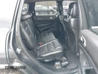 2011 Jeep Grand Cherokee Laredo with VIN 1J4RR4GGXBC597743, listed as a IAAI auction lot 41897286 with 253,111 mi miles and . Bid and sale history available at DreamBid. Image 8.