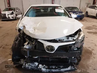 2019 Toyota Corolla L with VIN 2T1BURHE3KC132647, listed as a IAAI auction lot 42005289 with 34,077 mi miles and . Bid and sale history available at DreamBid. Image 6.