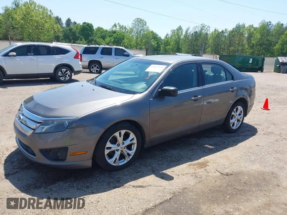 2012 Ford Fusion SE z VIN 3FAHP0HA4CR232641, wystawiony jako IAAI lot #42057070 z przebiegiem 180 793 mil mil oraz . Historia ofert i sprzedaży dostępna na DreamBid. Obrazek 18.