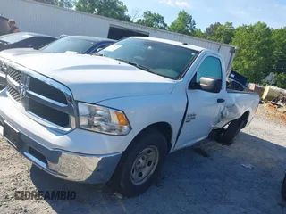 2022 Ram 1500 Tradesman with VIN 3C6JR6DG5NG412610, listed as a IAAI auction lot 42192125 with 31,341 mi miles and . Bid and sale history available at DreamBid. Image 14.