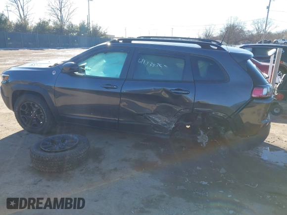 2022 Jeep Cherokee Trailhawk with VIN 1C4PJMBX9ND522235, listed as a IAAI auction lot 41738257 with 24,911 mi miles and . Bid and sale history available at DreamBid. Image 6.