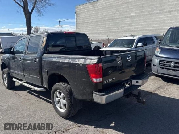 2004 Nissan Titan LE with VIN 1N6AA07A84N590583, listed as a Copart auction lot 49112705 with 92,426 mi miles and Salvage Title. Bid and sale history available at DreamBid. Image 3.
