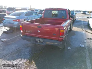 1999 Ford Ranger XLT with VIN 1FTZR15X1XTA90177, listed as a IAAI auction lot 41328368 with 360,832 mi miles. Bid and sale history available at carsss.com. Image 4.