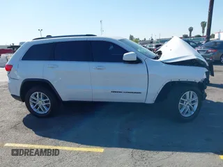 2018 Jeep Grand Cherokee Laredo E with VIN 1C4RJEAGXJC260645, listed as a IAAI auction lot 42002545 with Not provided miles and . Bid and sale history available at DreamBid. Image 13.