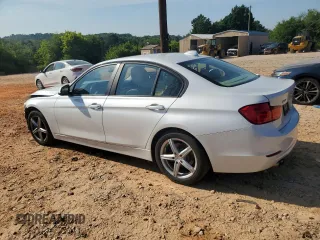 2014 BMW 3 Series 328i xDrive with VIN WBA3B5C51EF958576, listed as a Copart auction lot 62089375 with 148,140 mi miles and Salvage title. Bid and sale history available at DreamBid. Image 2.