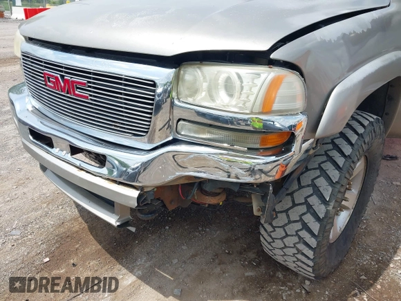 2003 GMC Sierra 1500HD SLT z VIN 1GTGK13U93F108499, wystawiony jako IAAI lot #42149012 z przebiegiem 296 775 mil mil oraz . Historia ofert i sprzedaży dostępna na DreamBid. Obrazek 6.