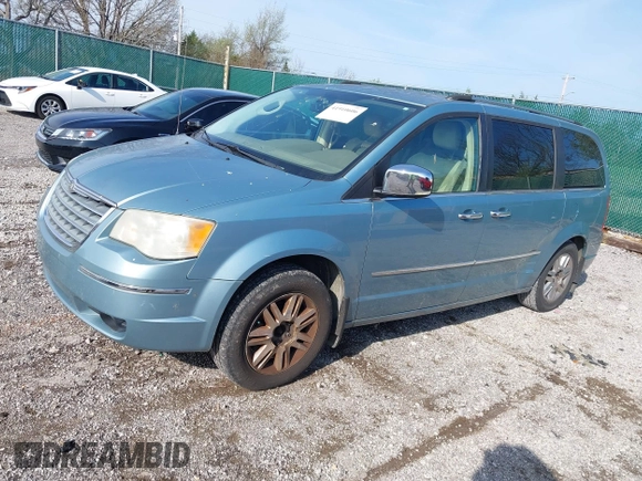2010 Chrysler Town & Country Limited with VIN 2A4RR6DX0AR237189, listed as a IAAI auction lot 41910606 with 169,317 mi miles. Bid and sale history available at carsss.com. Image 2.