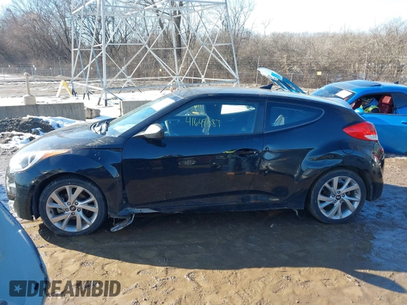 2016 Hyundai Veloster z VIN KMHTC6AD1GU262391, wystawiony jako IAAI lot #41649087 z przebiegiem 96 104 mil mil oraz . Historia ofert i sprzedaży dostępna na DreamBid. Obrazek 14.