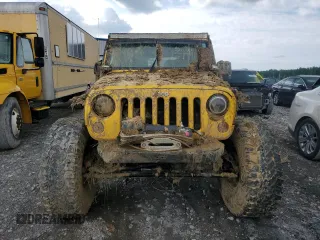 2009 Jeep Wrangler X with VIN 1J4FA24119L754391, listed as a Copart auction lot 56067805 with 118,117 mi miles and Salvage title. Bid and sale history available at DreamBid. Image 5.