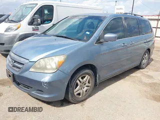 2007 Honda Odyssey EX-L with VIN 5FNRL38647B085123, listed as a IAAI auction lot 42154519 with 168,587 mi miles and . Bid and sale history available at carsss.com. Image 2.