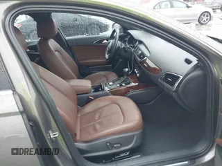 2014 Audi A6 Premium Plus z VIN WAUGFAFC3EN087176, wystawiony jako IAAI lot #42117602 z przebiegiem 53 571 mil mil oraz . Historia ofert i sprzedaży dostępna na DreamBid. Obrazek 5.