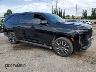 2021 Cadillac Escalade z VIN 1GYS3PKL6MR288828, wystawiony jako Copart lot #78219414 z przebiegiem 22 362 mil mil oraz Czysty tytuł • Clean title. Historia ofert i sprzedaży dostępna na DreamBid. Obrazek 4.