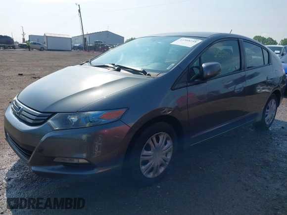 2011 Honda Insight LX z VIN JHMZE2H54BS000481, wystawiony jako IAAI lot #42368258 z przebiegiem 256 894 mil mil oraz . Historia ofert i sprzedaży dostępna na DreamBid. Obrazek 17.