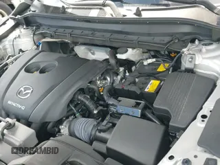 2025 Mazda CX-5 S Select z VIN JM3KFBBL9S0683367, wystawiony jako IAAI lot #43545055 z przebiegiem 12 620 mil mil oraz . Historia ofert i sprzedaży dostępna na DreamBid. Obrazek 19.