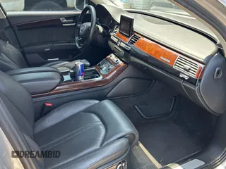 2013 Audi A8 3.0L with VIN WAURGAFD6DN010072, listed as a Copart auction lot 57999295 with 116,555 mi miles and Salvage title. Bid and sale history available at DreamBid. Image 5.