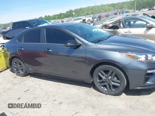 2021 Kia Forte GT-Line z VIN 3KPF34AD2ME341973, wystawiony jako IAAI lot #42084462 z przebiegiem 61 542 mil mil oraz . Historia ofert i sprzedaży dostępna na DreamBid. Obrazek 13.