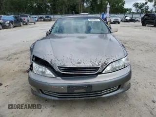 2001 Lexus ES 300 with VIN JT8BF28G615110977, listed as a Copart auction lot 55073025 with 194,948 mi miles and Salvage Title. Bid and sale history available at DreamBid. Image 5.