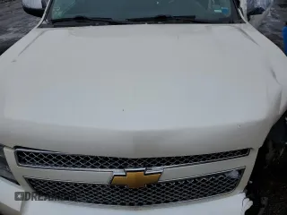 2012 Chevrolet Suburban LTZ with VIN 1GNSKKE77CR326213, listed as a Copart auction lot 44882115 with 132,842 mi miles and Salvage Title. Bid and sale history available at carsss.com. Image 12.