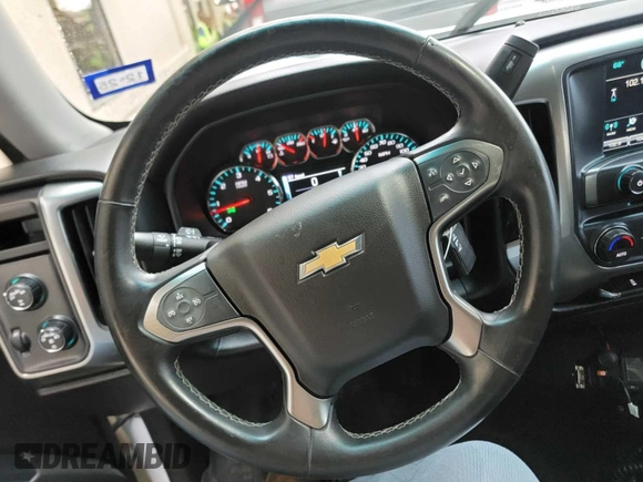 2017 Chevrolet Silverado 1500 LT with VIN 3GCUKREC8HG324467, listed as a IAAI auction lot 42274627 with 169,402 mi miles and . Bid and sale history available at DreamBid. Image 13.