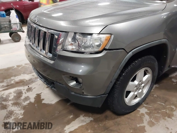 2011 Jeep Grand Cherokee Laredo with VIN 1J4RR4GG3BC623048, listed as a IAAI auction lot 42163452 with 192,241 mi miles and . Bid and sale history available at DreamBid. Image 12.