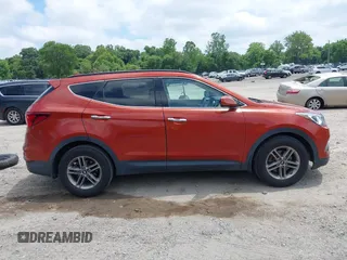 2017 Hyundai Santa Fe 2.4L z VIN 5XYZUDLB1HG463416, wystawiony jako IAAI lot #42546637 z przebiegiem 81 963 mil mil oraz . Historia ofert i sprzedaży dostępna na DreamBid. Obrazek 13.