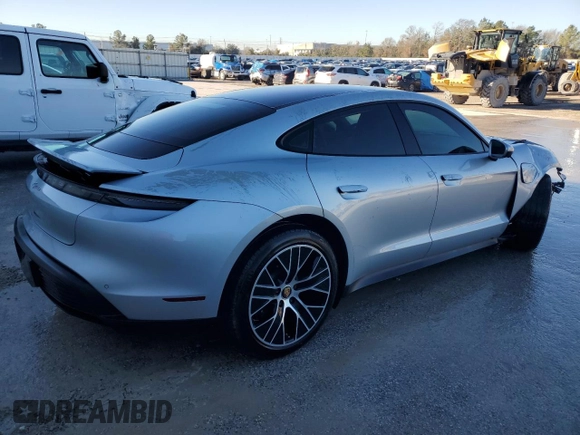 2021 Porsche Taycan z VIN WP0AA2Y14MSA18735, wystawiony jako Copart lot #43588095 z przebiegiem Nie podano mil oraz Szkody całkowita. Historia ofert i sprzedaży dostępna na DreamBid. Obrazek 3.