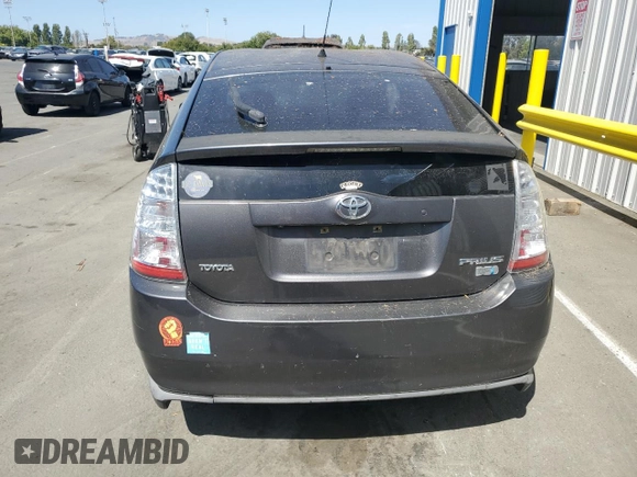 2007 Toyota Prius z VIN JTDKB20U373216659, wystawiony jako Copart lot #60930375 z przebiegiem 155 283 mil mil oraz Czysty tytuł • Clean title. Historia ofert i sprzedaży dostępna na DreamBid. Obrazek 6.