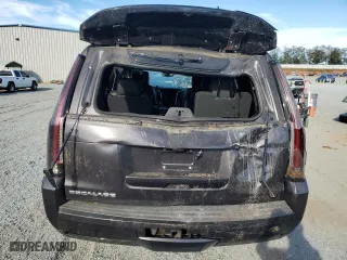 2017 Cadillac Escalade Platinum with VIN 1GYS4DKJ1HR354671, listed as a Copart auction lot 77090654 with 108,495 mi miles and Salvage Title. Bid and sale history available at carsss.com. Image 6.