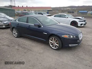 2015 Jaguar XF V6 Portfolio with VIN SAJWJ0FF5F8U67140, listed as a IAAI auction lot 41967522 with 68,000 mi miles. Bid and sale history available at carsss.com. Image 1.