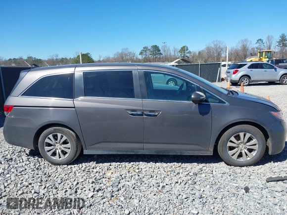 2014 Honda Odyssey EX-L with VIN 5FNRL5H61EB014695, listed as a IAAI auction lot 41694860 with 261,265 mi miles and . Bid and sale history available at DreamBid. Image 13.
