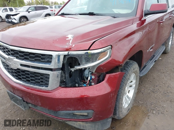 2020 Chevrolet Suburban LT with VIN 1GNSKHKC9LR233603, listed as a IAAI auction lot 41311582 with 104,754 mi miles. Bid and sale history available at carsss.com. Image 6.