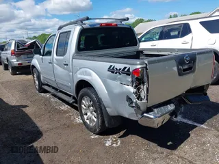 2011 Nissan Frontier Pro-4X with VIN 1N6AD0EV0BC408218, listed as a IAAI auction lot 42187823 with 165,995 mi miles and . Bid and sale history available at DreamBid. Image 3.