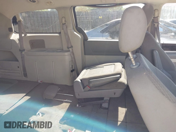 2010 Dodge Grand Caravan SXT with VIN 2D4RN5D12AR210330, listed as a IAAI auction lot 42146969 with 233,607 mi miles and . Bid and sale history available at DreamBid. Image 8.