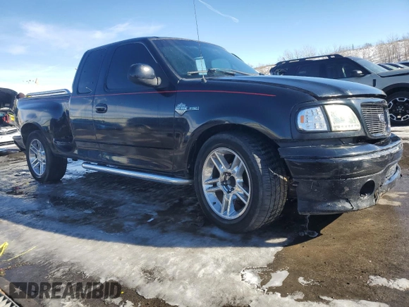 2000 Ford F-150 XL with VIN 2FTRX07L0YCB10621, listed as a Copart auction lot 42147705 with Not provided miles and Salvage title. Bid and sale history available at DreamBid. Image 4.