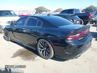 2018 Dodge Charger SXT Plus with VIN 2C3CDXHG9JH281387, listed as a IAAI auction lot 41402210 with 132,881 mi miles and . Bid and sale history available at carsss.com. Image 3.
