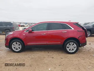 2023 Cadillac XT5 FWD Luxury z VIN 1GYKNAR42PZ147121, wystawiony jako IAAI lot #41315848 z przebiegiem 10 444 mil mil oraz . Historia ofert i sprzedaży dostępna na DreamBid. Obrazek 14.