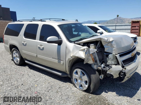 2013 Chevrolet Suburban LT with VIN 1GNSCJE06DR140058, listed as a Copart auction lot 56317995 with 124,345 mi miles and Salvage title. Bid and sale history available at DreamBid. Image 4.