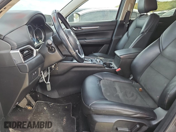 2018 Mazda CX-5 Touring z VIN JM3KFBCM4J0349687, wystawiony jako Copart lot #55857945 z przebiegiem Nie podano mil oraz Szkoda całkowita • Salvage title. Historia ofert i sprzedaży dostępna na DreamBid. Obrazek 7.
