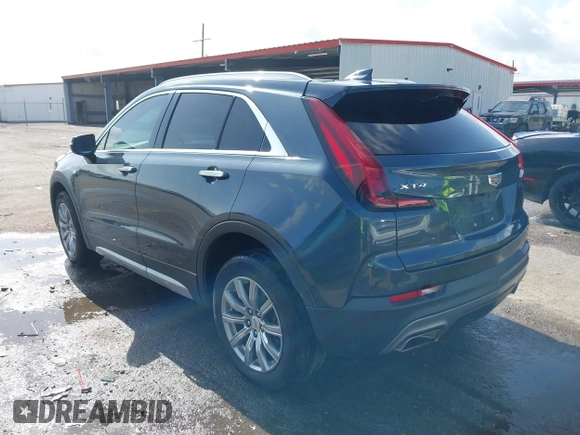 2021 Cadillac XT4 FWD Premium Luxury with VIN 1GYFZCR42MF007617, listed as a IAAI auction lot 42437974 with 126,071 mi miles and . Bid and sale history available at DreamBid. Image 3.