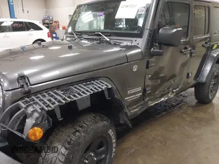 2018 Jeep Wrangler JK Unlimited Sport S with VIN 1C4BJWDGXJL889020, listed as a IAAI auction lot 41989203 with 60,170 mi miles. Bid and sale history available at carsss.com. Image 6.